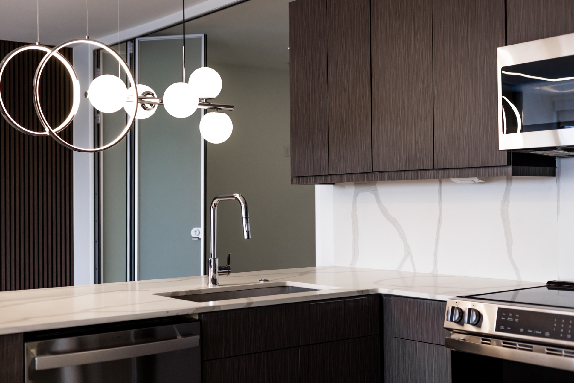 Kitchen island with designer pendant lights