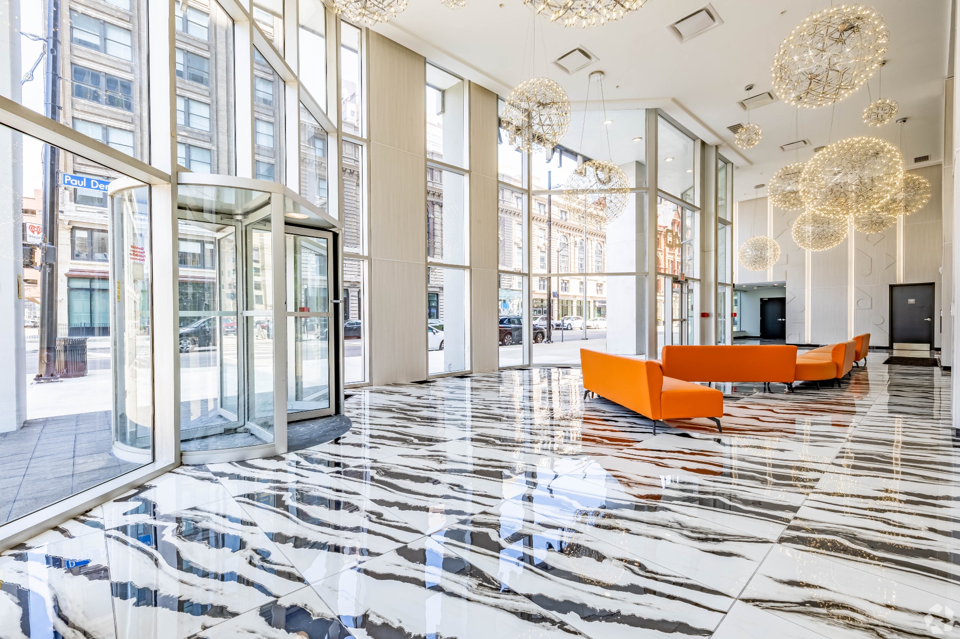 Grand lobby with marble floors and chandeliers